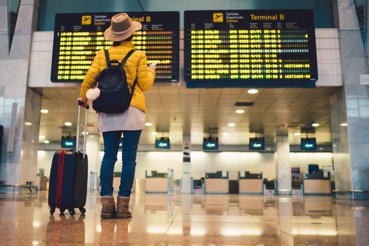 Image of a woman at an airport.